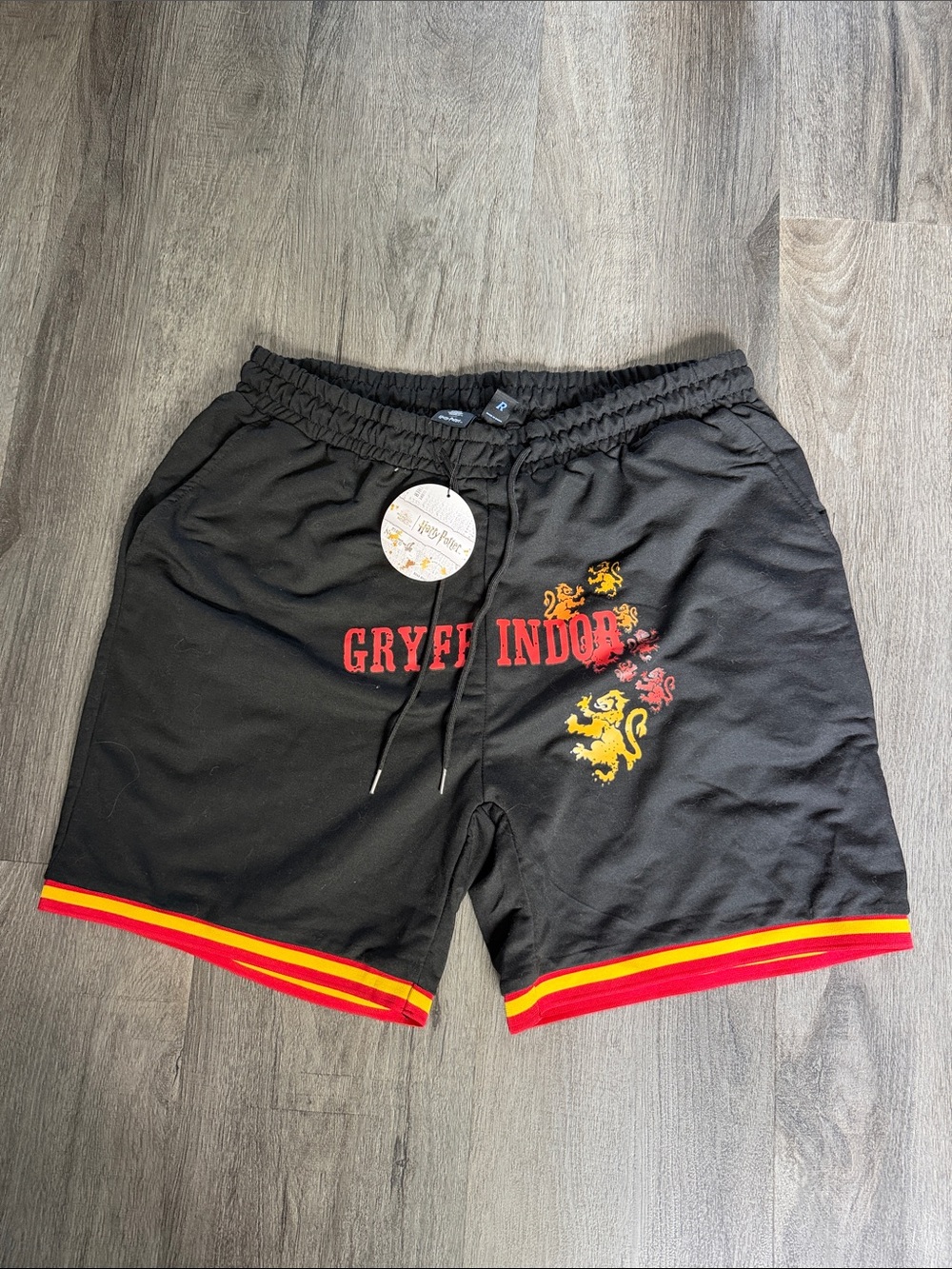 ROMWE Black Athletic Shorts with Red & Yellow Trim